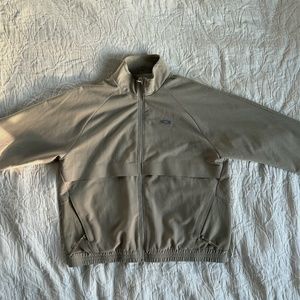 FIGS women's SYDNEY scrub jacket in SANDSTONE